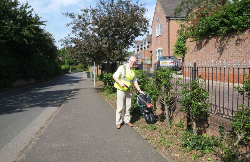 Cllr Stan Rooney out litter picking.