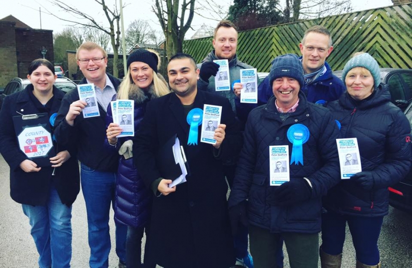 Peter Bedford, centre, and campaign team members.