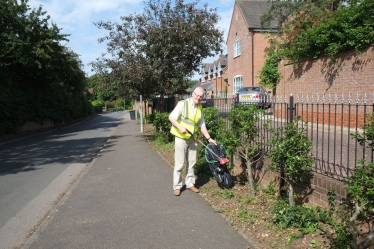 Cllr Stan Rooney out litter picking.