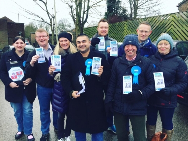 Peter Bedford, centre, and campaign team members.